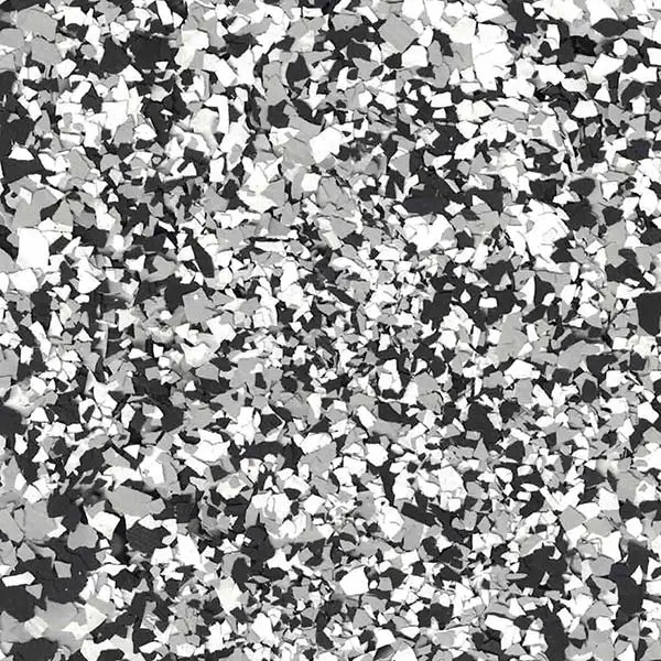 The image shows a close-up of a monochrome, abstract texture with various shades of gray and black in a scattered pattern.