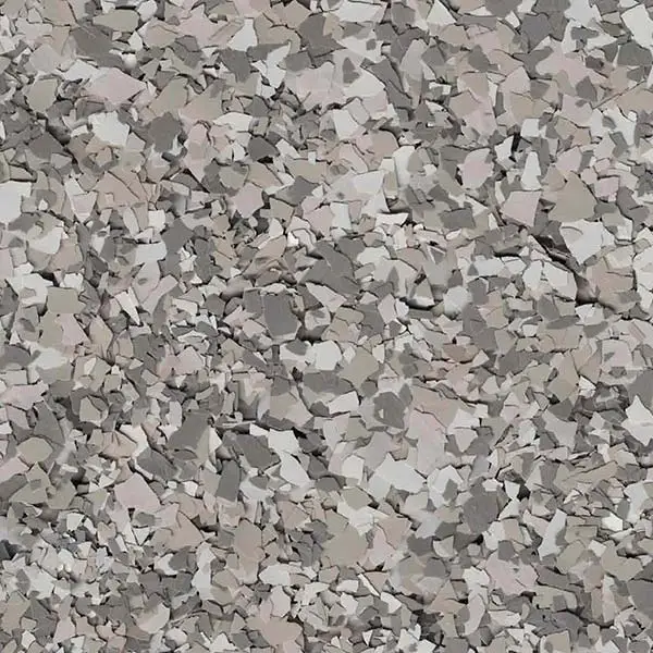 The image features a textured surface with a pattern of small, irregularly-shaped gray and white fragments resembling a stone or concrete finish.
