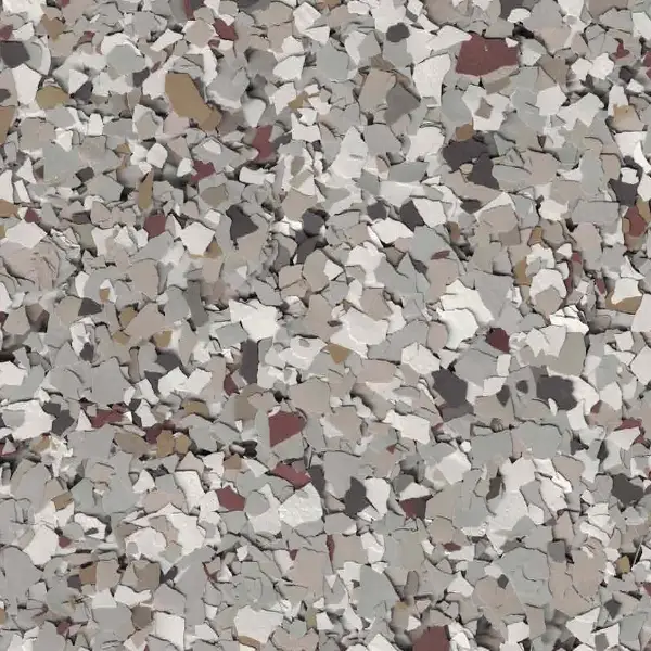 A textured surface with scattered small stone fragments in various shades of grey, brown, and cream, resembling an abstract terrazzo pattern.