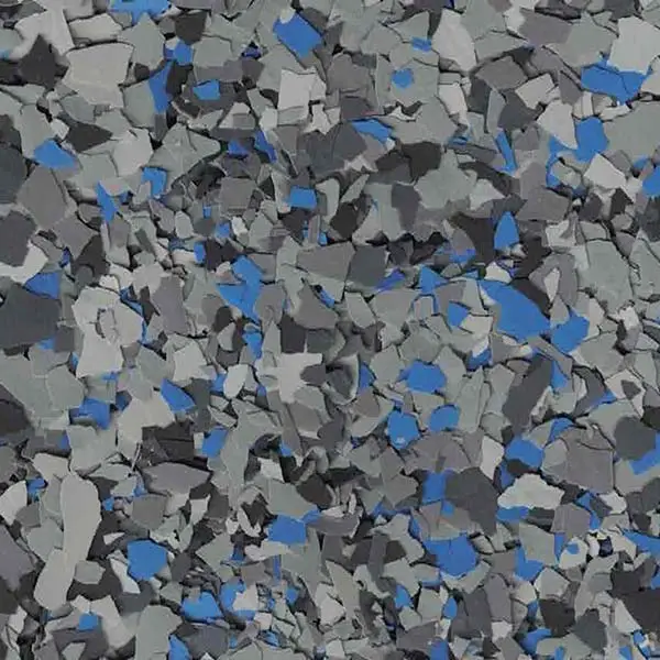 A textured surface with scattered gray and blue fragments, resembling terrazzo flooring. The pattern is abstract with no identifiable landmarks or buildings.
