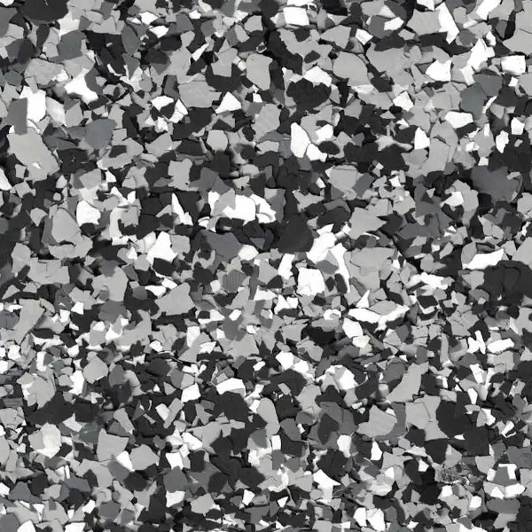 The image features a high-contrast, abstract pattern of black, white, and gray shapes resembling scattered paper pieces against a flat background.
